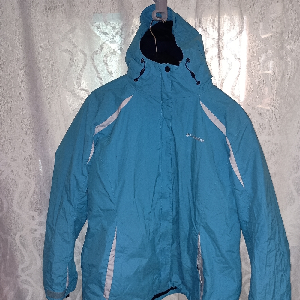Columbia Blue Ski Jacket with Attached Hood and Water-Resistant Material